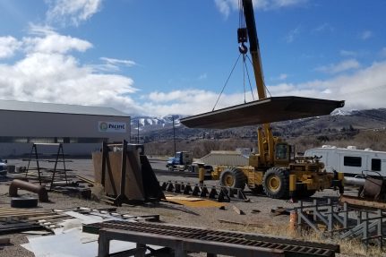 crane carrying metal