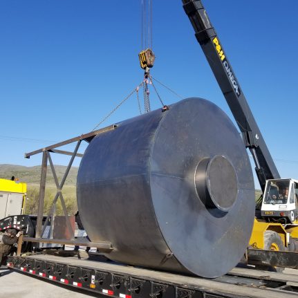 crane loading metal piece