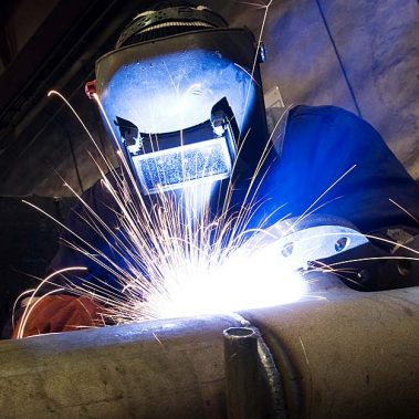 welder wearing hood